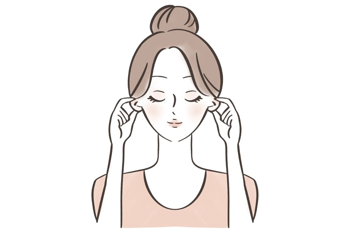 耳を折りたたむマッサージをする女性のイラスト